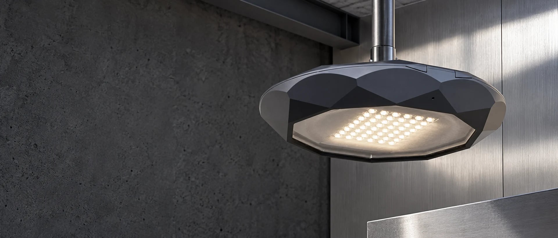 AI-generated industrial product visualization of the LUXiFiC Mantis-H faceted outdoor luminaire